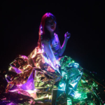 A person in costume on stage